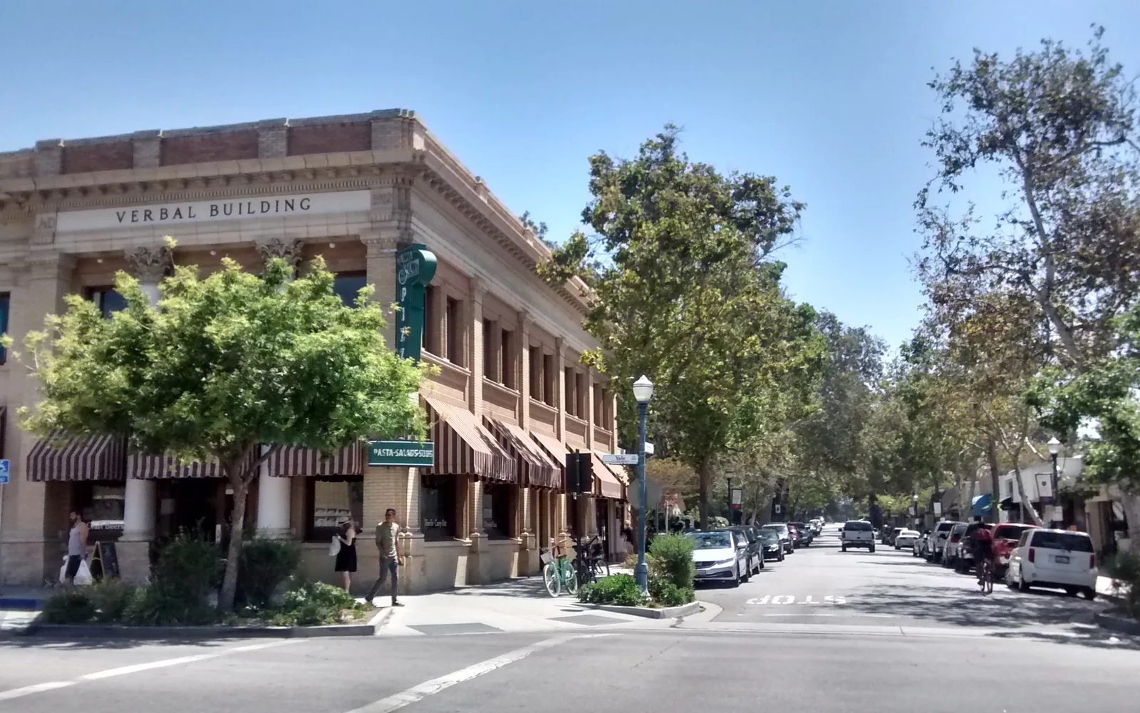 Historic downtown Claremont building with classical architecture and storefronts